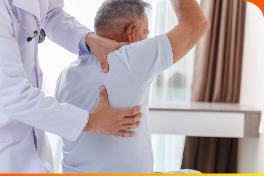 Orthopedic physiotherapist helping senior patient with joint rehabilitation at SAI Healthcare Wellness Center, Patna