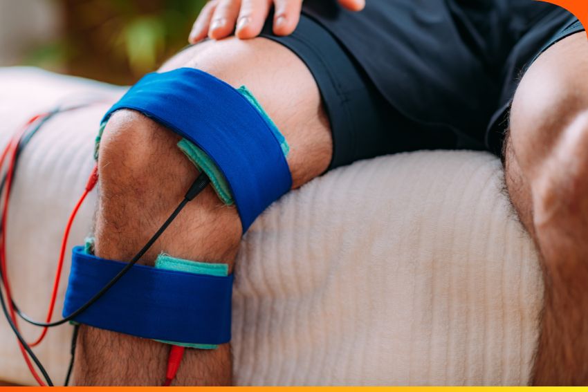 Close-up of electrotherapy and cupping therapy session for chronic pain management at SAI Healthcare Wellness Center, Patna